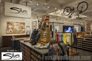 Updated Silver Jeans commercial design with fake wood beams. Silver Jeans Co store at Woodlands, Texas made great use of artificial ceiling beams.