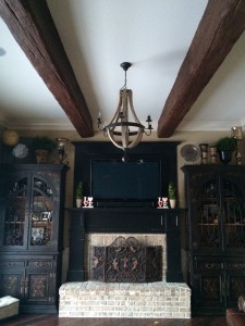 AFTER: Lee's room looks magnificent with the addition of two faux wood beams.