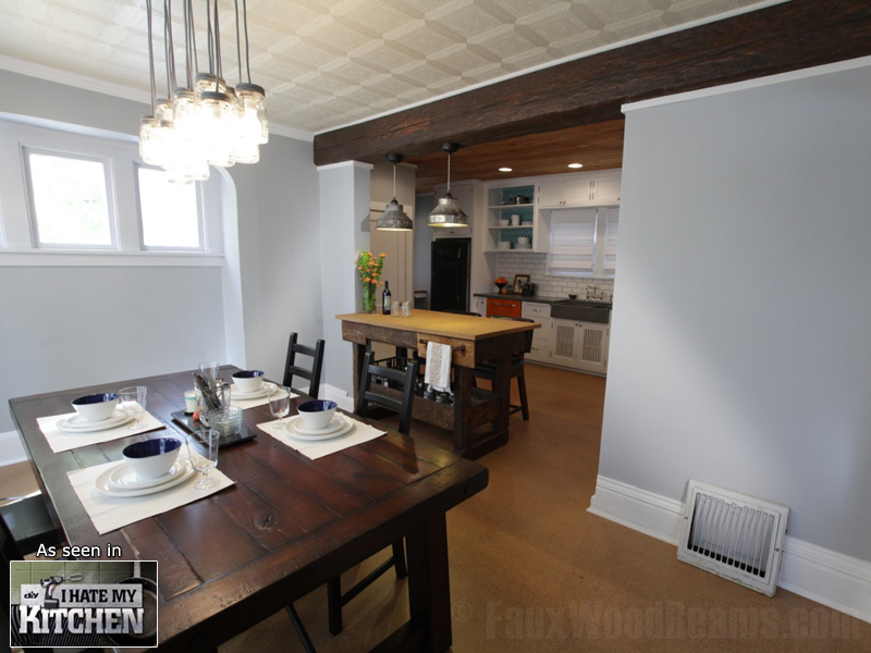 Kitchen makeover on TV's I Hate My Kitchen with single ceiling beam accenting the divider wall.