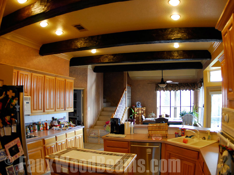 Kitchen makeover with Timber style beams on the ceiling.