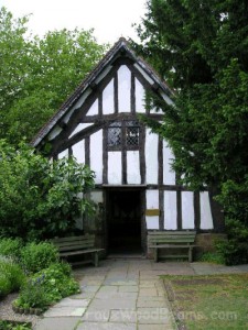 Tudor style planking on the exterior of a small home.