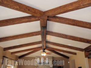 Ceiling beams attached to a smooth ceiling creates a clean line.