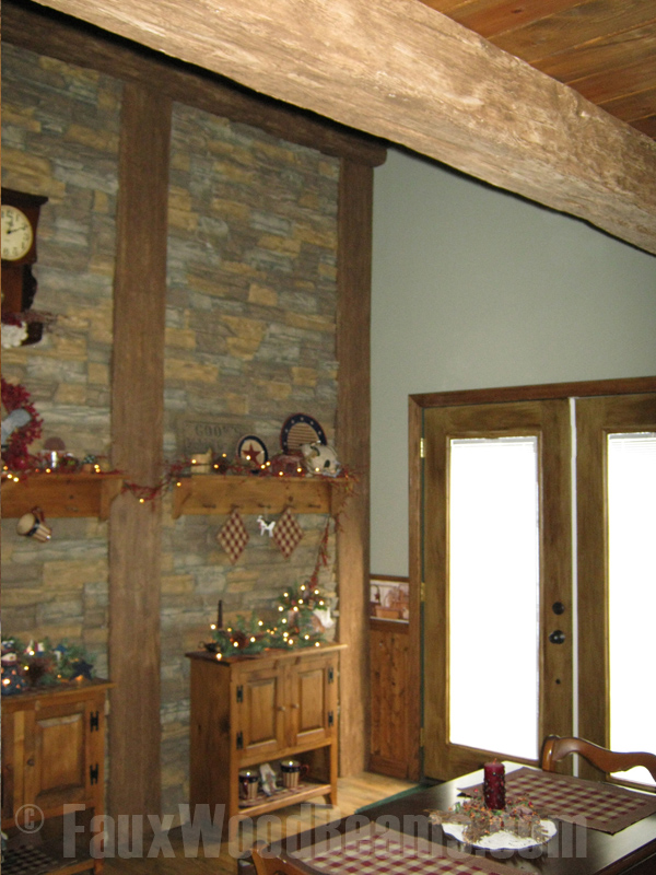 Planks added to the walls and ceiling of a country kitchen