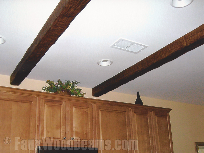 Custom Timber beams add rustic character to the kitchen