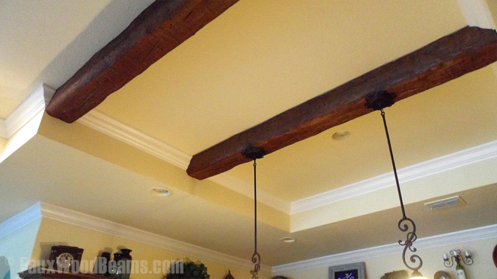 Kitchen recessed ceiling with Custom Timber beams.