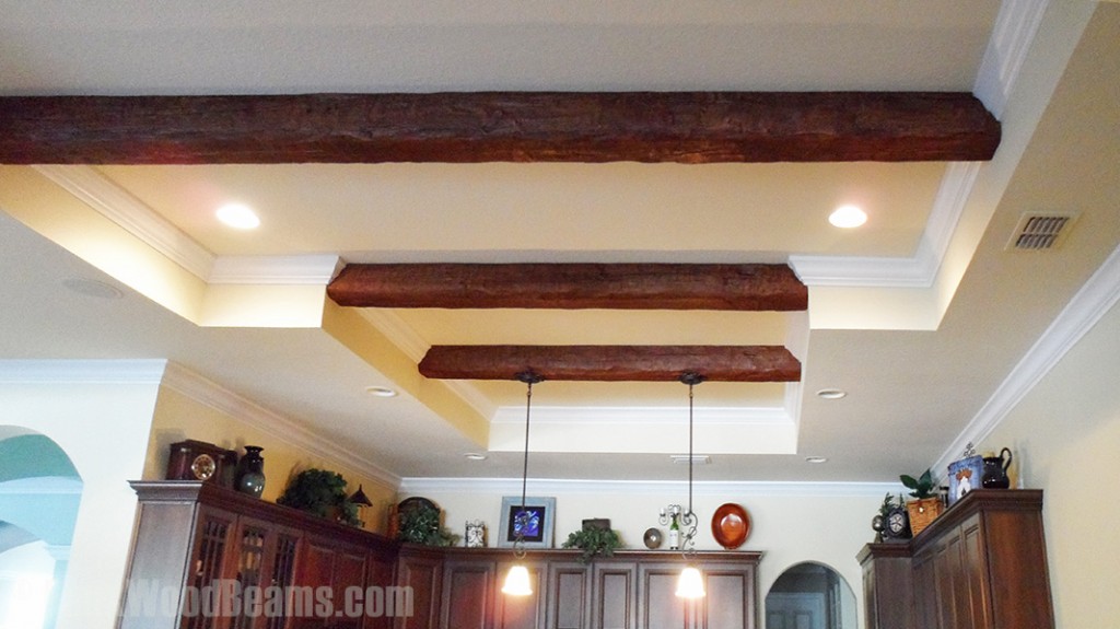 Custom Timber beams installed in a kitchen's recessed ceiling.