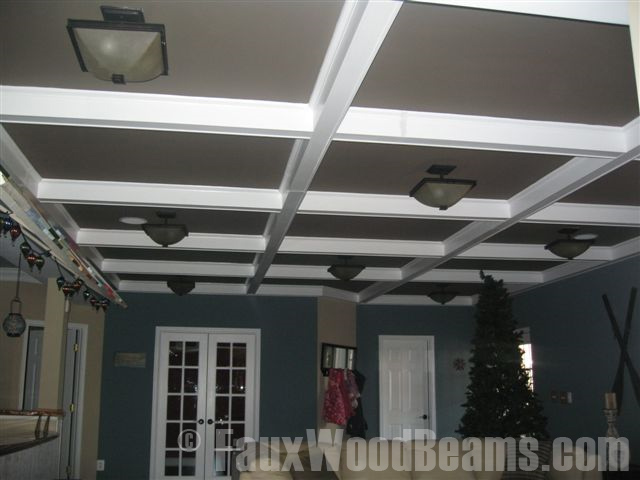 The coffered ceiling in this room is made with our Regal beams.
