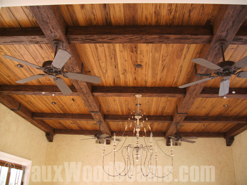 This is a rustic coffered ceiling created with our Pecky Cypress beams.