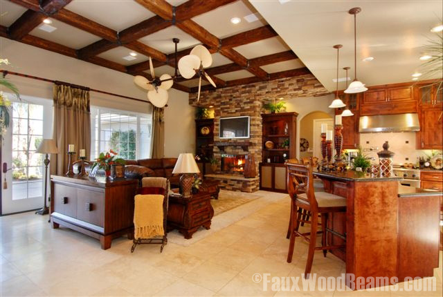 The beautiful coffered ceiling in this living room area is made with Custom Timber beams.
