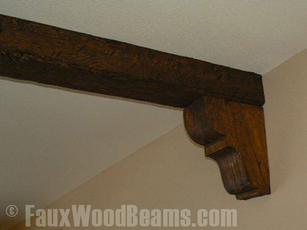 Close up view of corbel on ceiling beam
