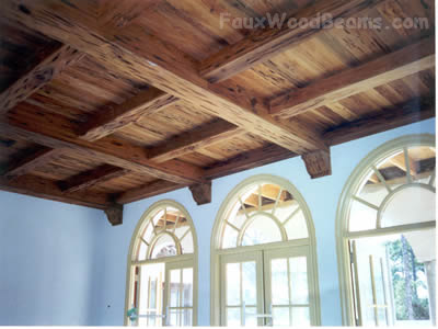 Panels, beams and corbels combine for a ceiling design full of depth and texture.