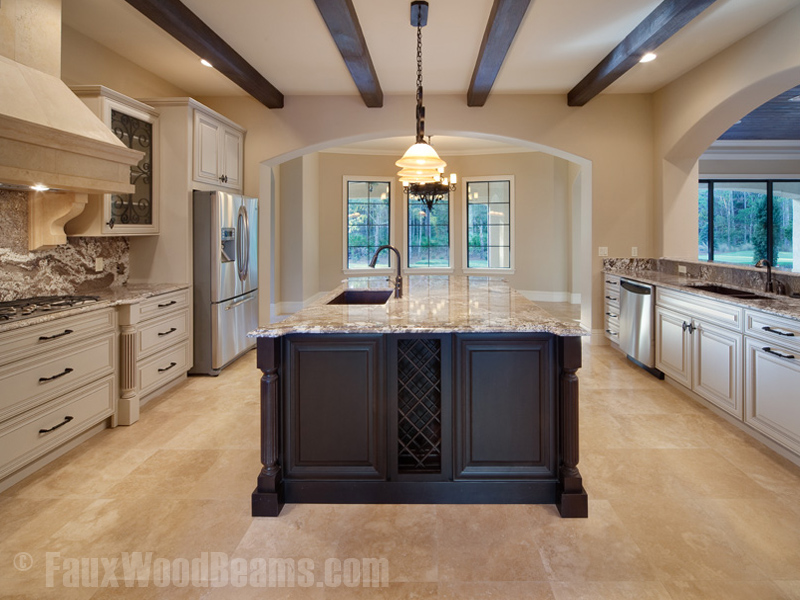 Kitchen with Chamfered style beams arranged in a simple parallel pattern.