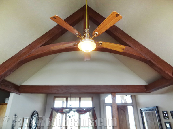 Patrick stained his faux wood Arched Woodland beams for a beautiful truss ceiling design.