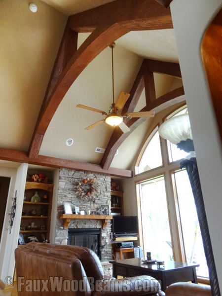 Patrick's stained Arched Woodland beams match his decor wonderfully.