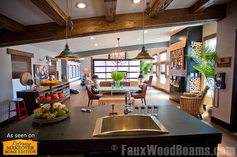 Open floor plan designs get added coziness with Pecky Cypress beams.