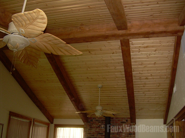 Lightly distressed beams create a soothing ceiling decor.