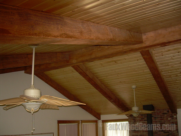 Lightly distressed beams give ceiling decor a fresh new look.