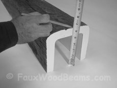 Take measurement of the beam.
