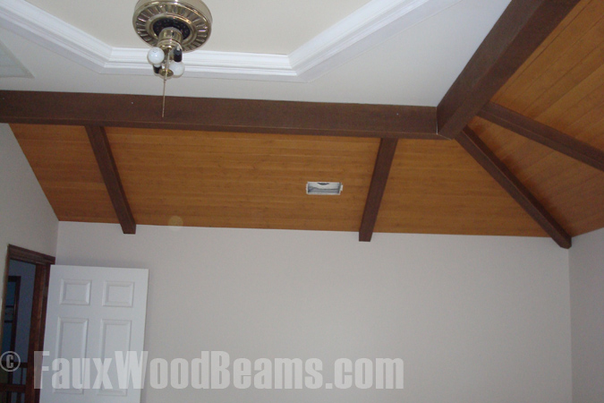Ceiling remodel on a tray ceiling with planks and beams