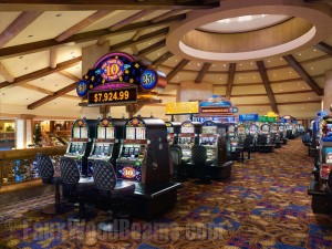 Faux rustic wood beams installed in a spider web pattern on Ameristar's gaming floor in Blackhawk, CO