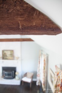 Cutting the beams at an angle allowed them to fit snugly with her ceiling.