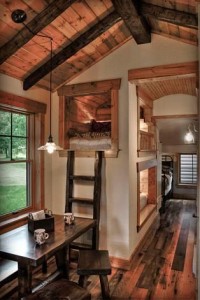 Faux wood ceiling treatment made with beams and panels.