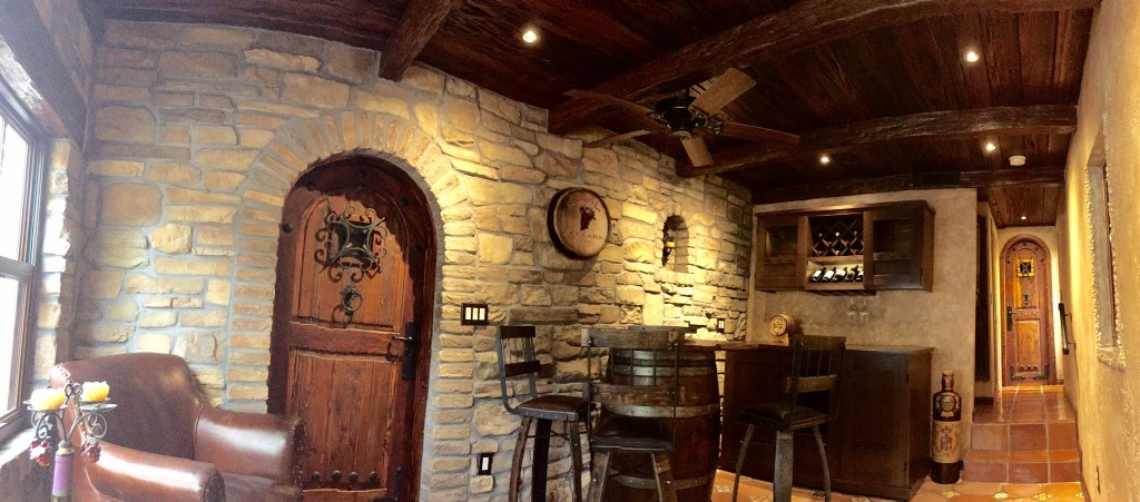 Home bar's ceiling remodel with real pecky cypress and synthetic wood beams combined.