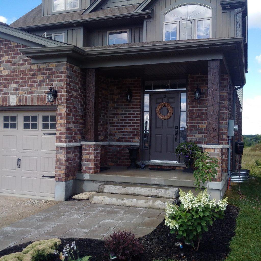 AFTER: The faux wood exterior columns look incredibly realistic, and effortlessly stylish.