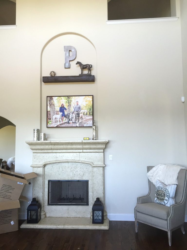 Alcove above a pale marble fireplace remodeled with a Beachwood mantel in Java color.