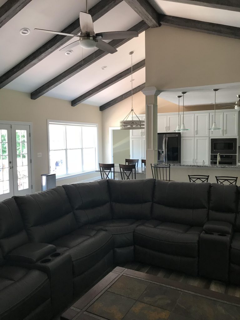 Great room vaulted ceiling with Custom Driftwood Beams