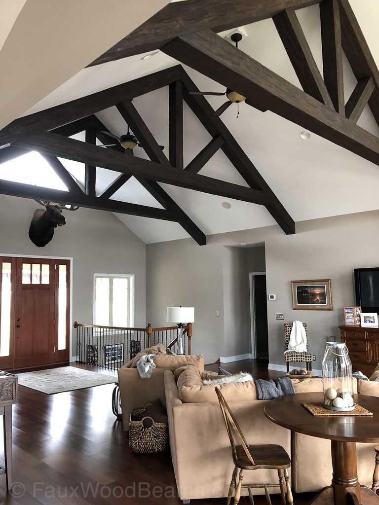 A-frame trusses made from Custom Timber beams installed in a living room.