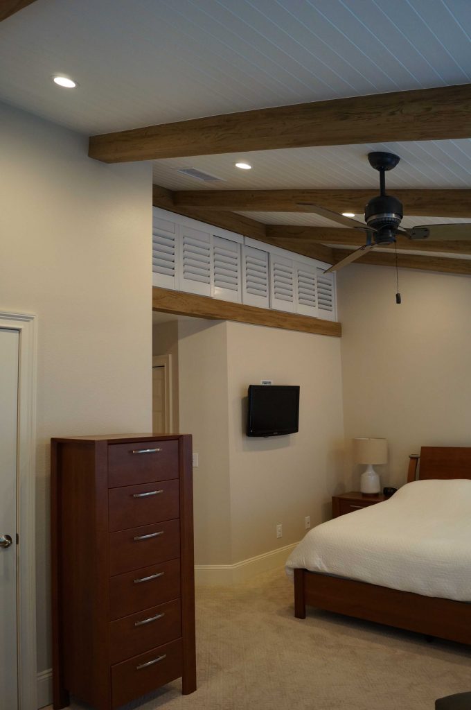 Bedroom redesign with new beadboard and Driftwood beams added to the ceiling.
