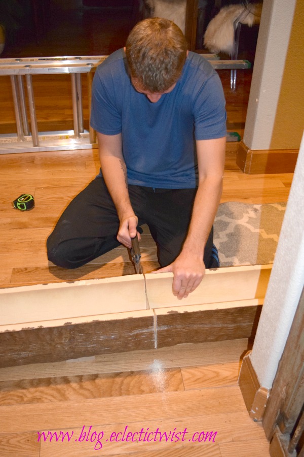 Cutting beams with a regular wood saw.