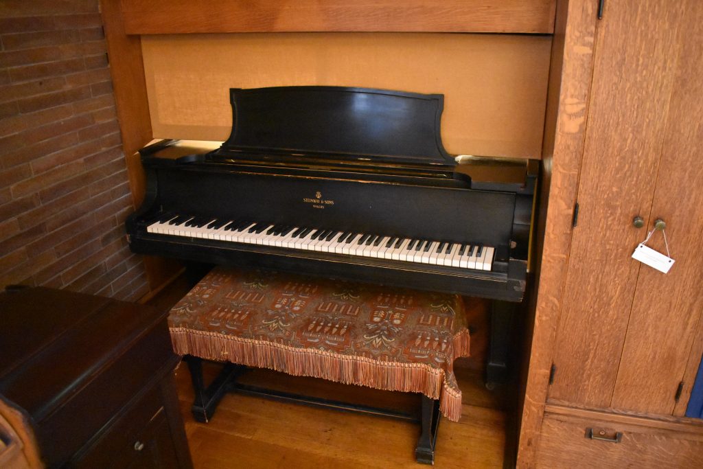 Grand piano inserted into a wall at the Frank Lloyd Wright Home and Studio.