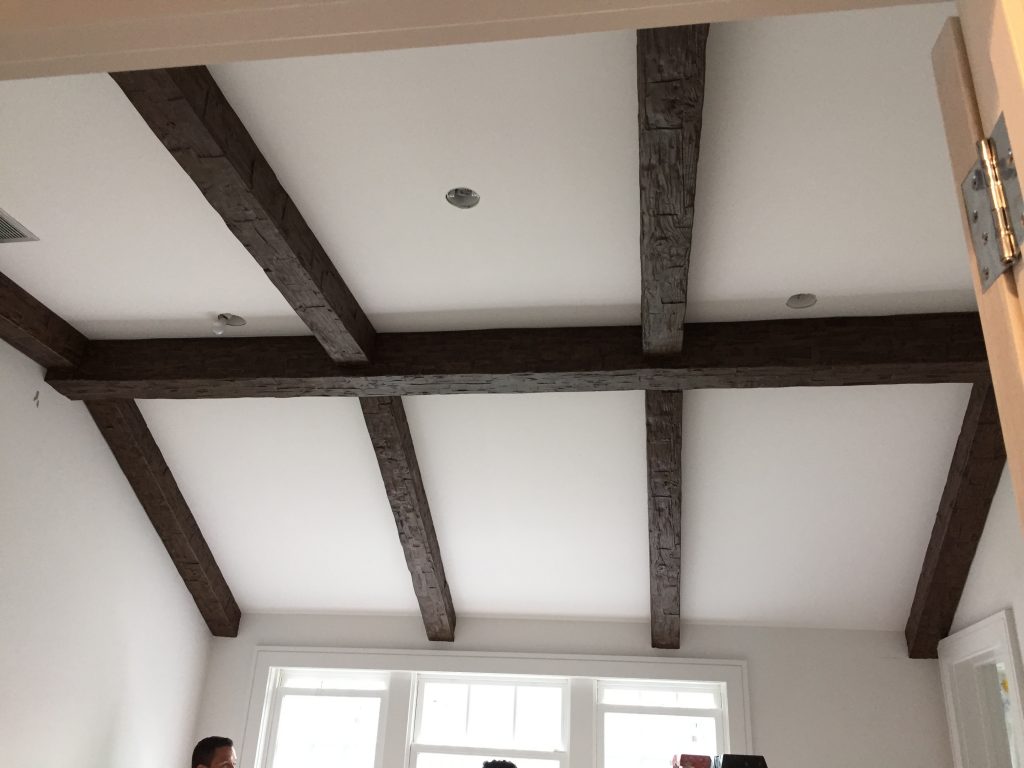 Bedroom ceiling renovation with beams added to new vaulted ceiling