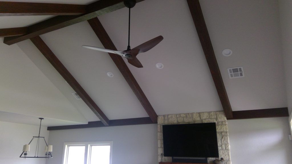 These ceiling beams were custom stained to match the other wood fixtures in the room.