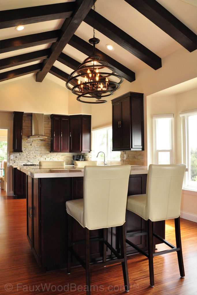 Kitchen with Beachwood beams installed in the ridge and rafters layout.