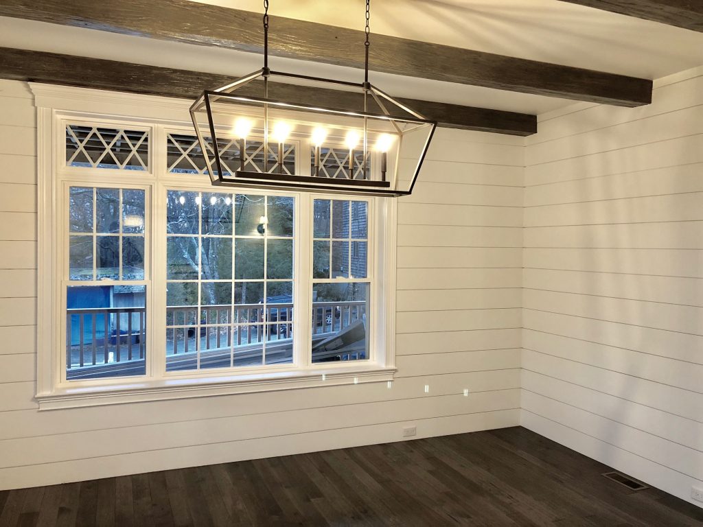 Michael stained the beams to match the other wood features in the home, including the hardwood floors.