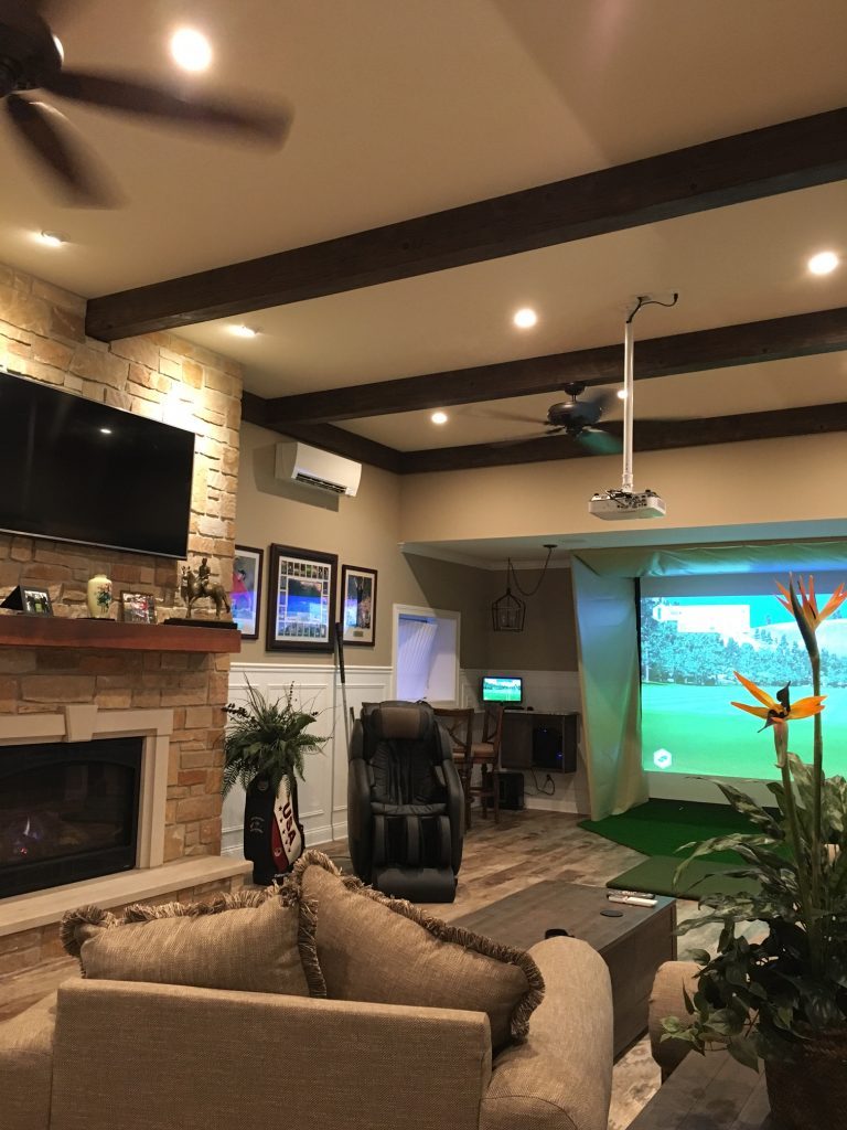 Ceiling beams meet the living room fireplace.