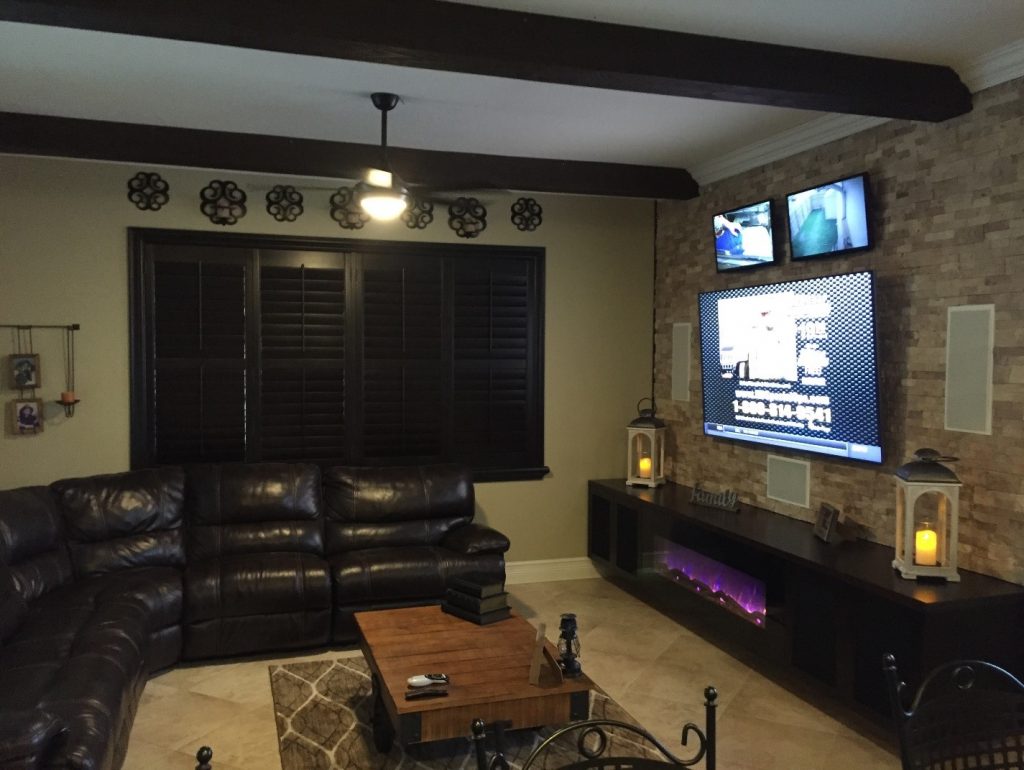 Reclaimed beams add a beautiful framework to the more open living room space.