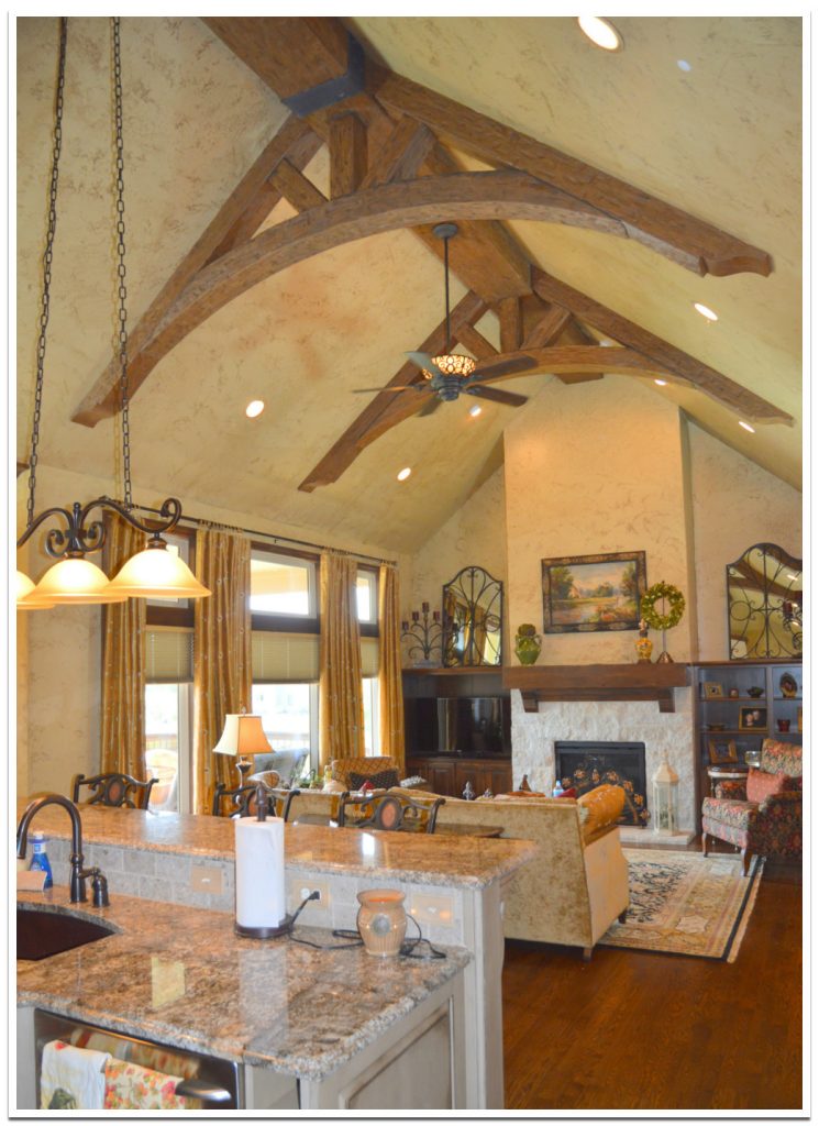 Kitchen and living room with curved trusses