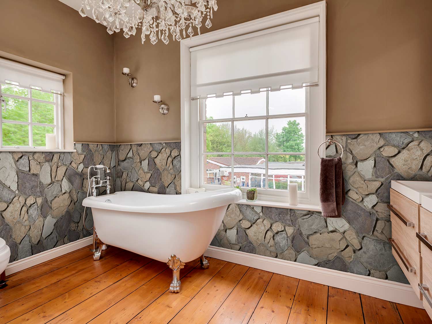 Anson Fieldstone Faux Stone Wall Panels in Blended Quarry installed on an inside corner