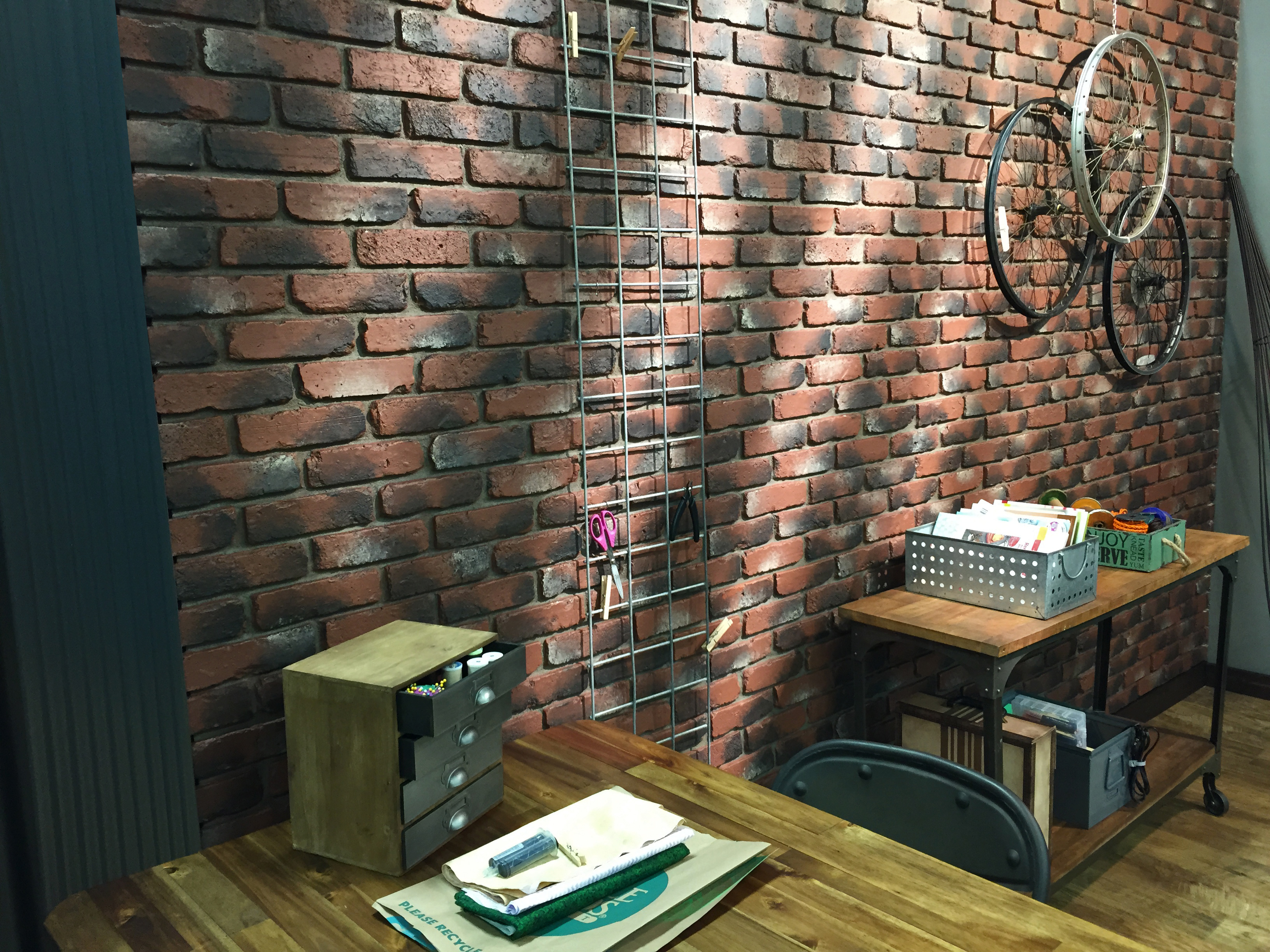 An accent faux brick or brick veneer wall in an office