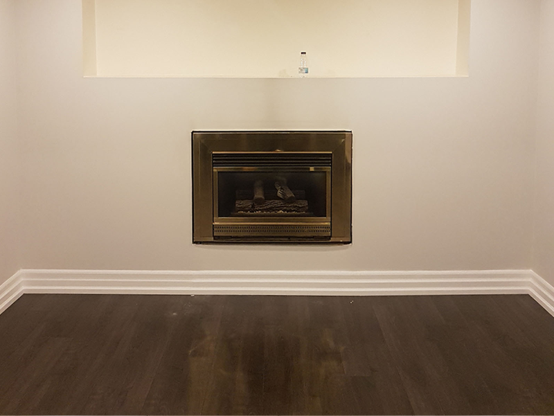 Homeowner before photo of fireplace