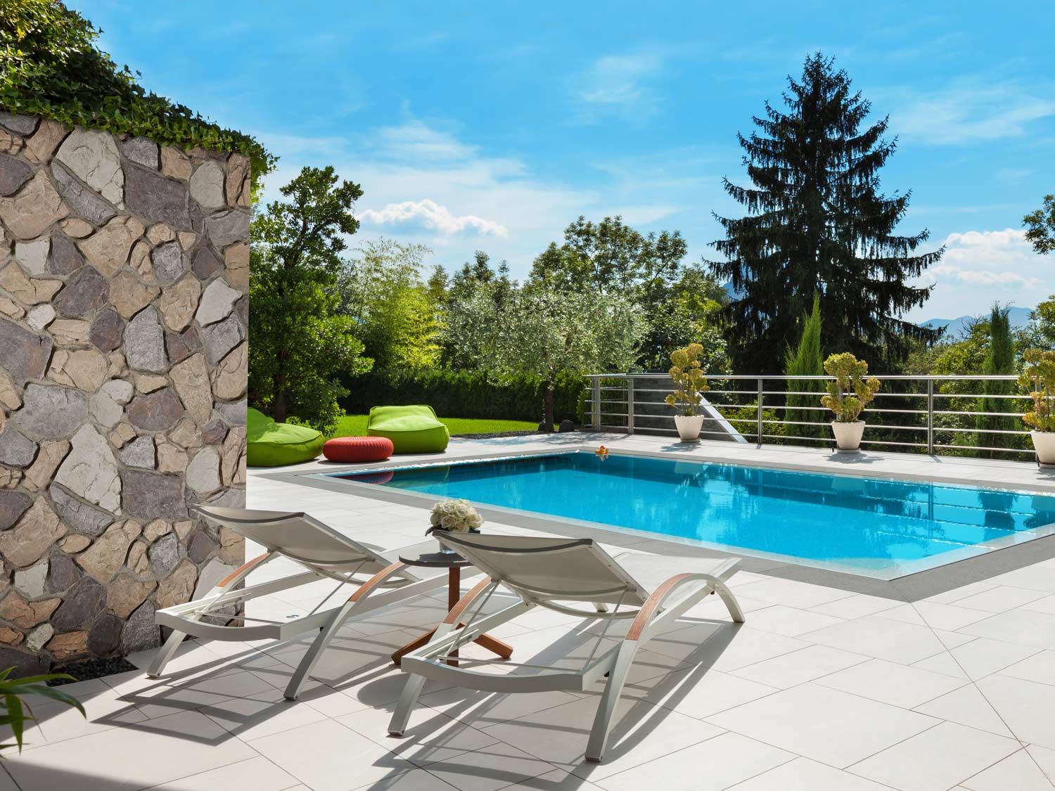 Anson fieldstone creating a relaxing outdoor pool area aesthetic
