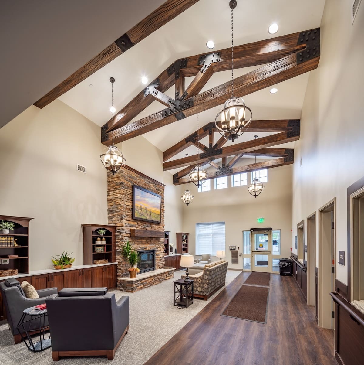 Dark walnut heritage faux wood beams used for a truss and mantel designs for a residential commercial feel