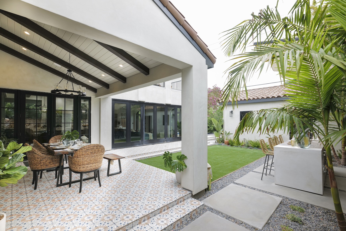 Dark Walnut Rough Hewn Faux Wood Beams decorating an outdoor patio ceiling