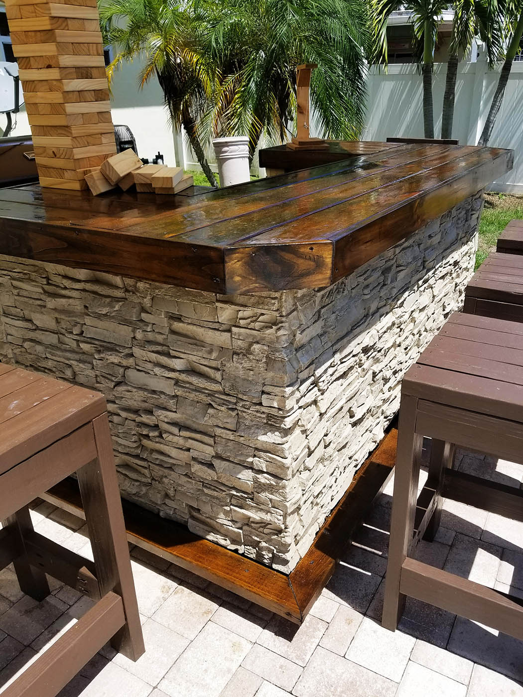 Designing a DIY outdoor bar with faux stone panels