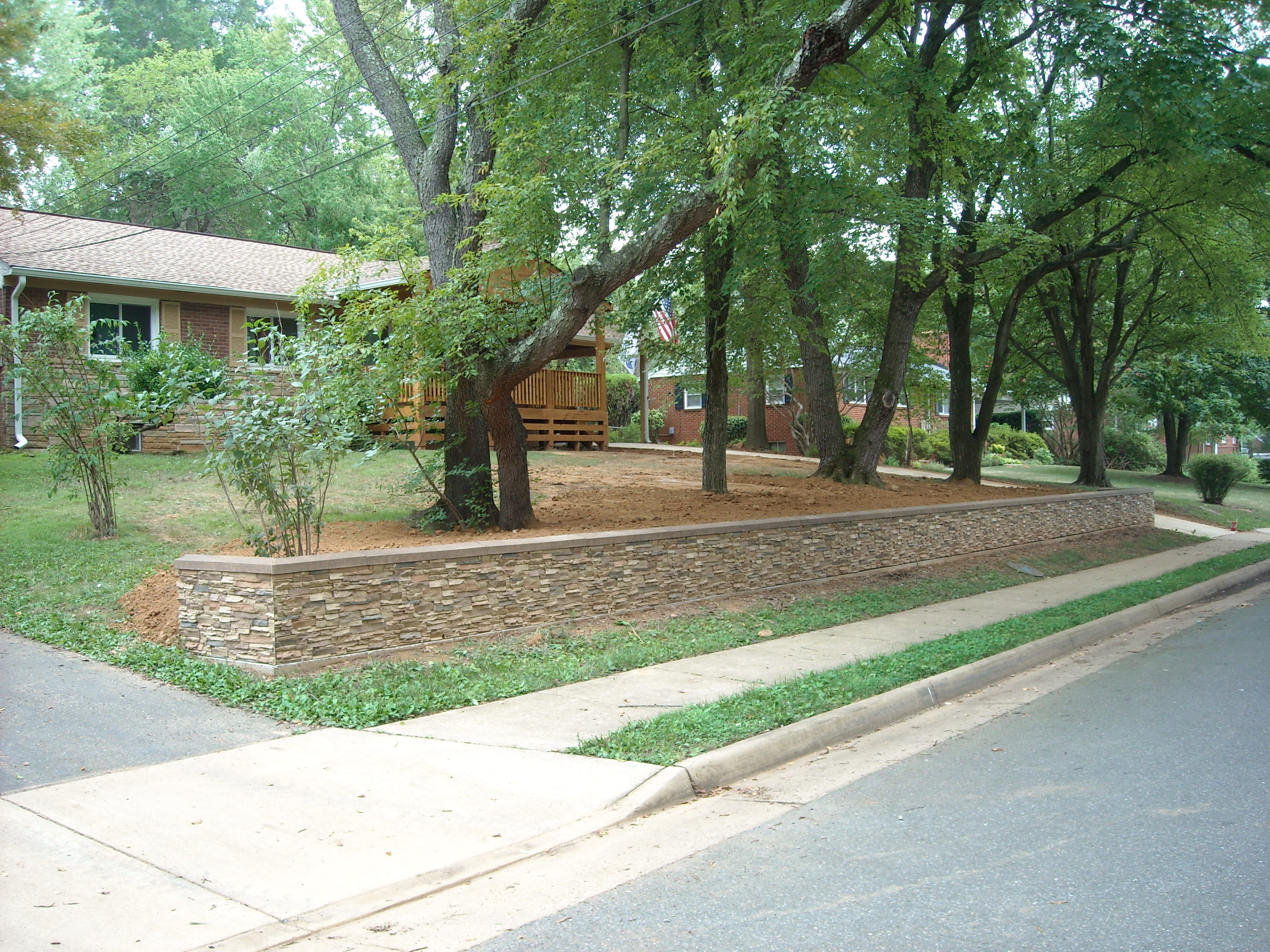 Ray's retaining wall is 70' long with 4' returns at each end.