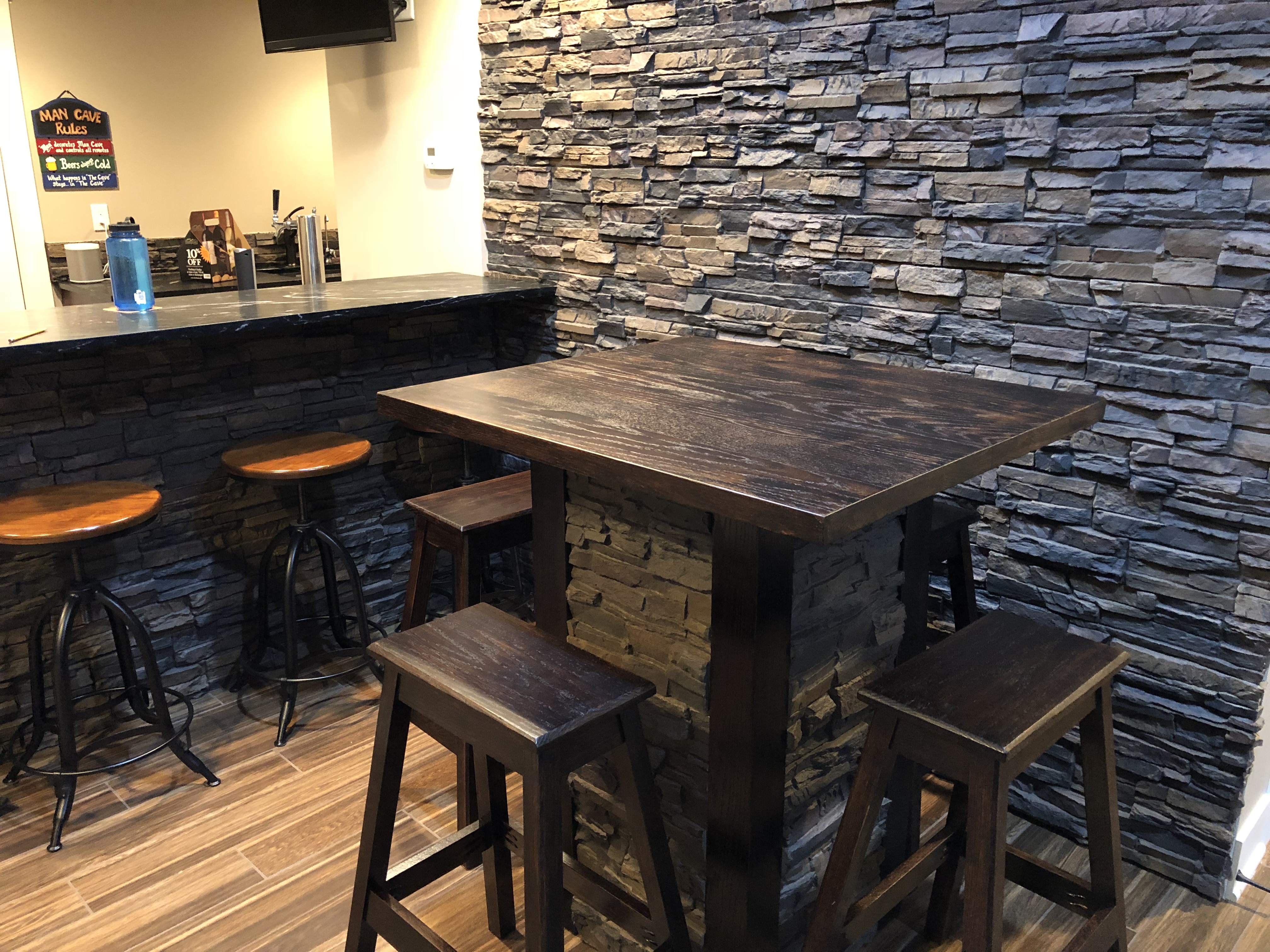 A Colorado Dry Stack Faux Stone Panel accent wall